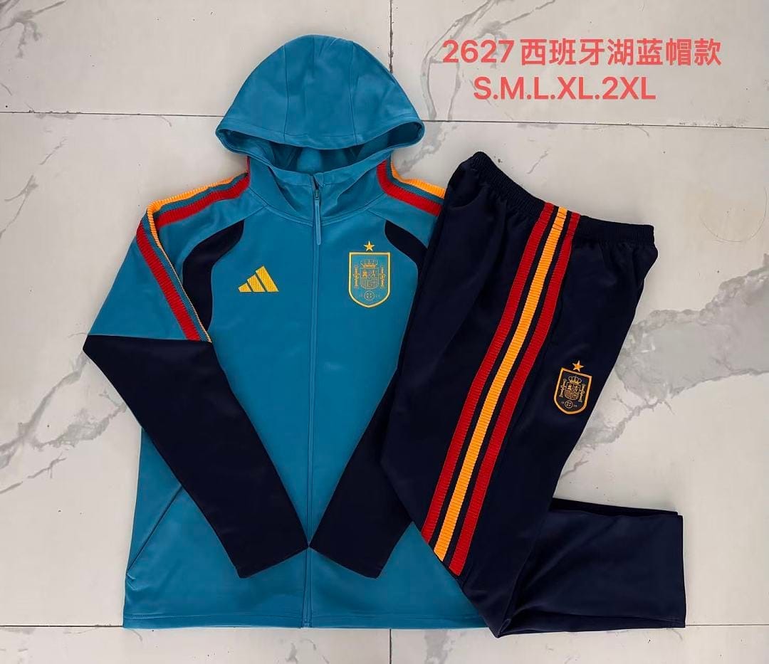 España 26/27 Chaqueta con Capucha · Celeste